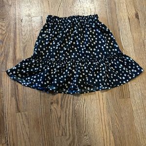 I'm selling a black and white flower skirt